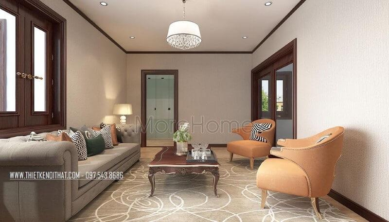 Thiết kế nội thất sofa khung gỗ tự nhiên nhập khẩu bọc vải màu sữa kết hợp chiếc bàn trà bằng gỗ tự nhiên mài nâu socola, cùng với 2 chiếc ghế nghỉ màu cam tạo sự sinh động mà không bị chật chội. Mẫu sofa gỗ sang trọng