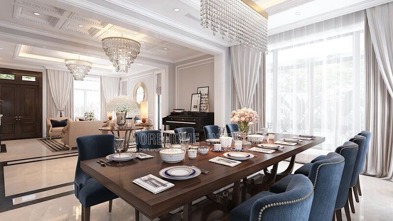 Mẫu thiết kế bàn ăn gỗ tự nhiện màu nâu trầm có kích thước lớn kết hợp với mẫu ghế ăn bọc nỉ cao cấp mang đến một không gian phòng ăn sang trọng, đẳng cấp cho căn biệt thự gia chủ