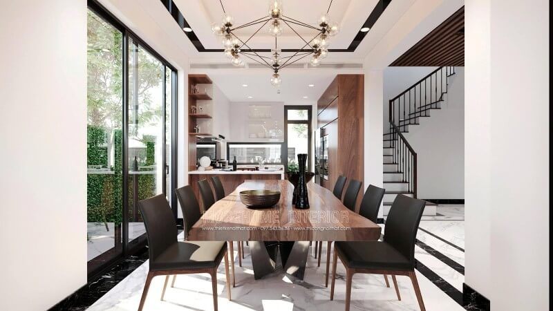 Bộ bàn ăn gỗ óc chó được thiết kế lạ mắt tạo nên một không gian dùng bữa đầy ấn tượng